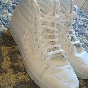 High-top, Classic white Vans.